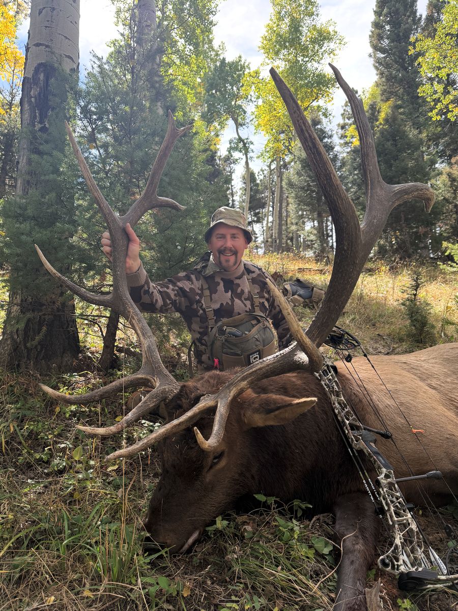 Elk caller Joel Turner with a seven-by-seven bull elk